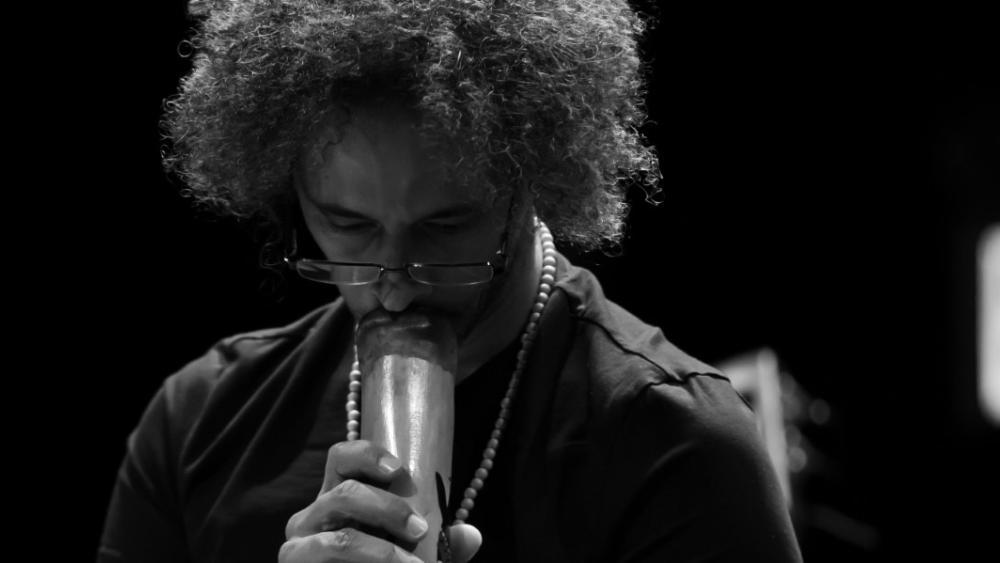 A headshot of Michael Mustafa Ulmer