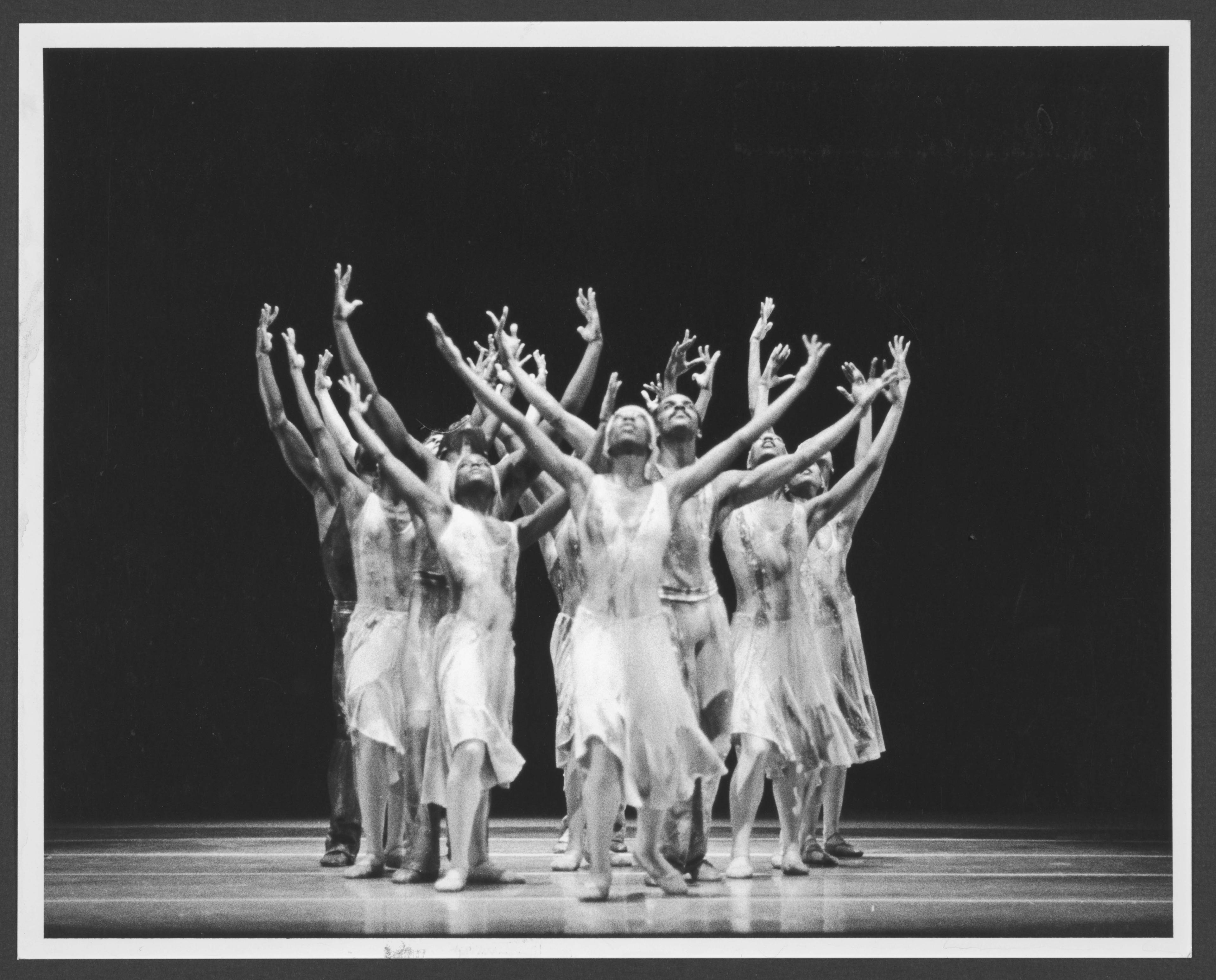 Black and white photo of a group of dancers.