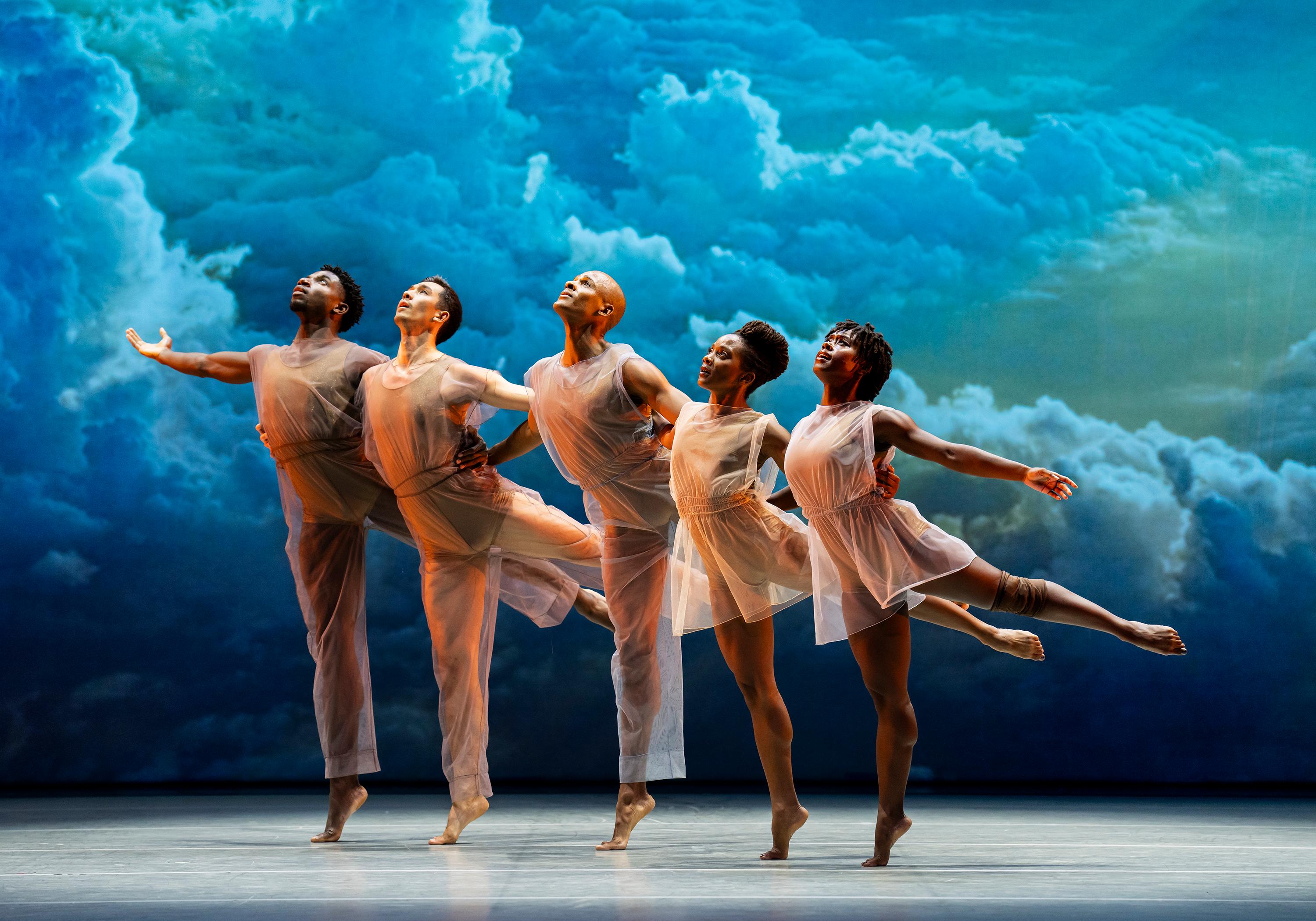 Five dancers in Lar Lubovitch's 'Many Angels' in arabesque.