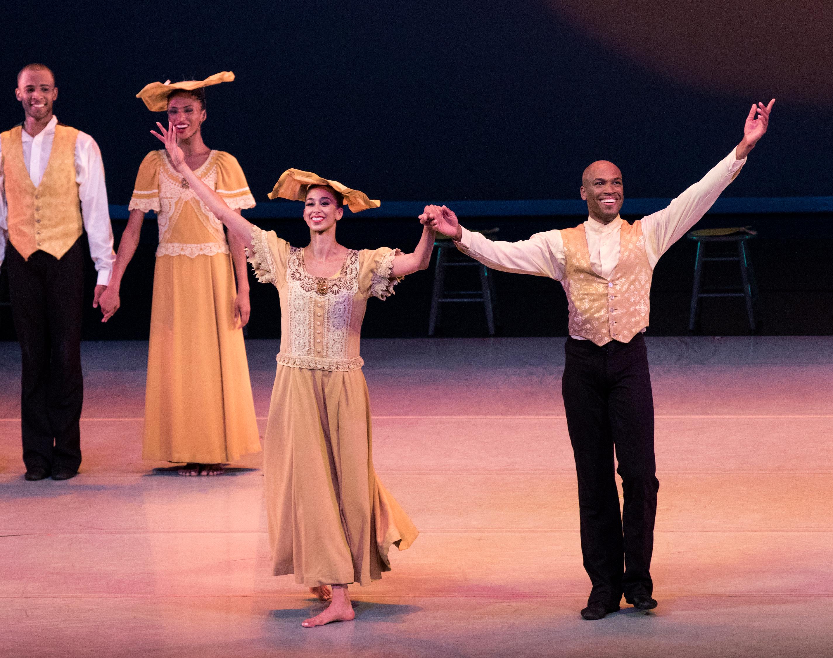 Alicia Graf Mack and Antonio Douthit-Boyd bow after Alvin Ailey's Revelations