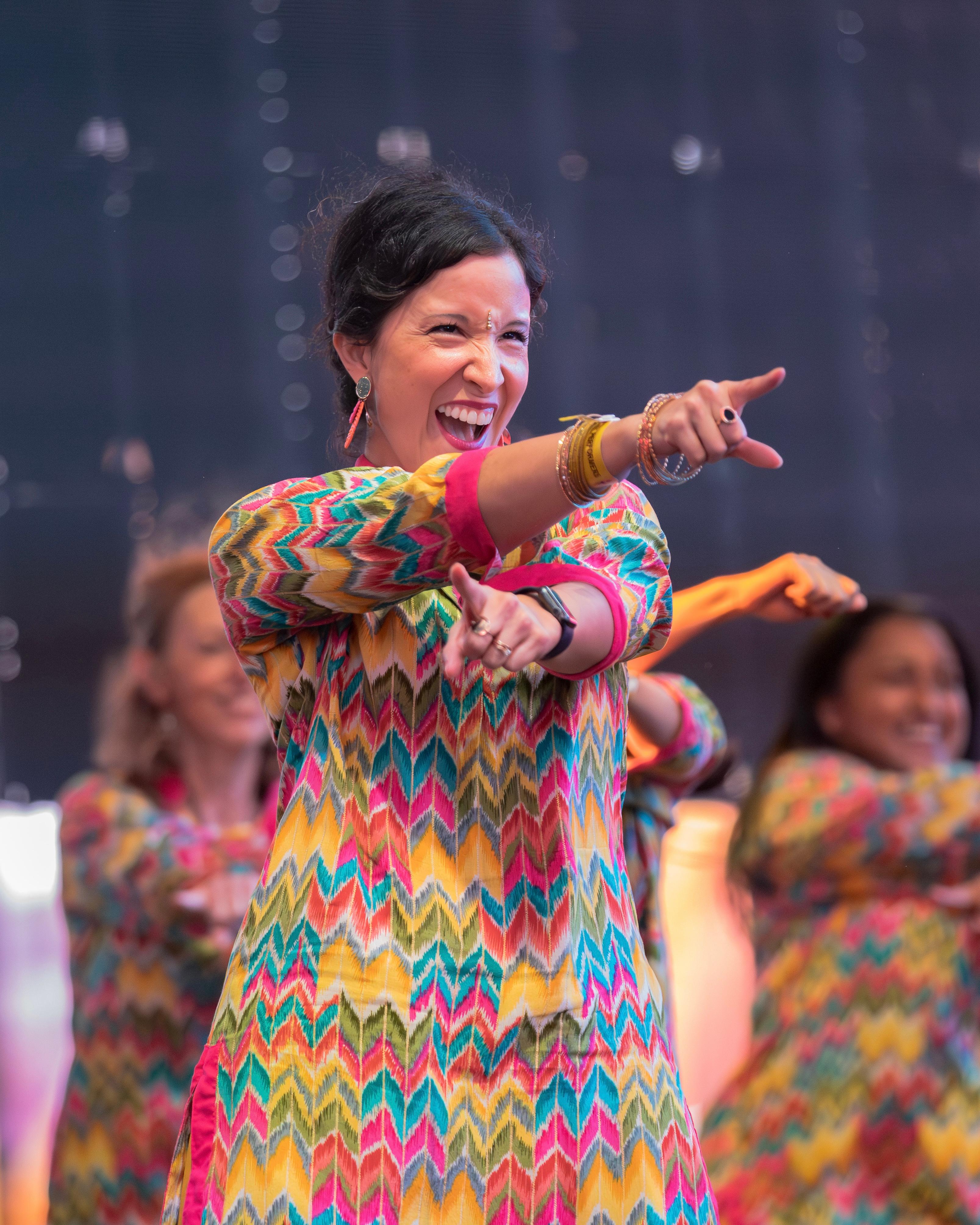 Marcela Sarmiento dancing on a stage