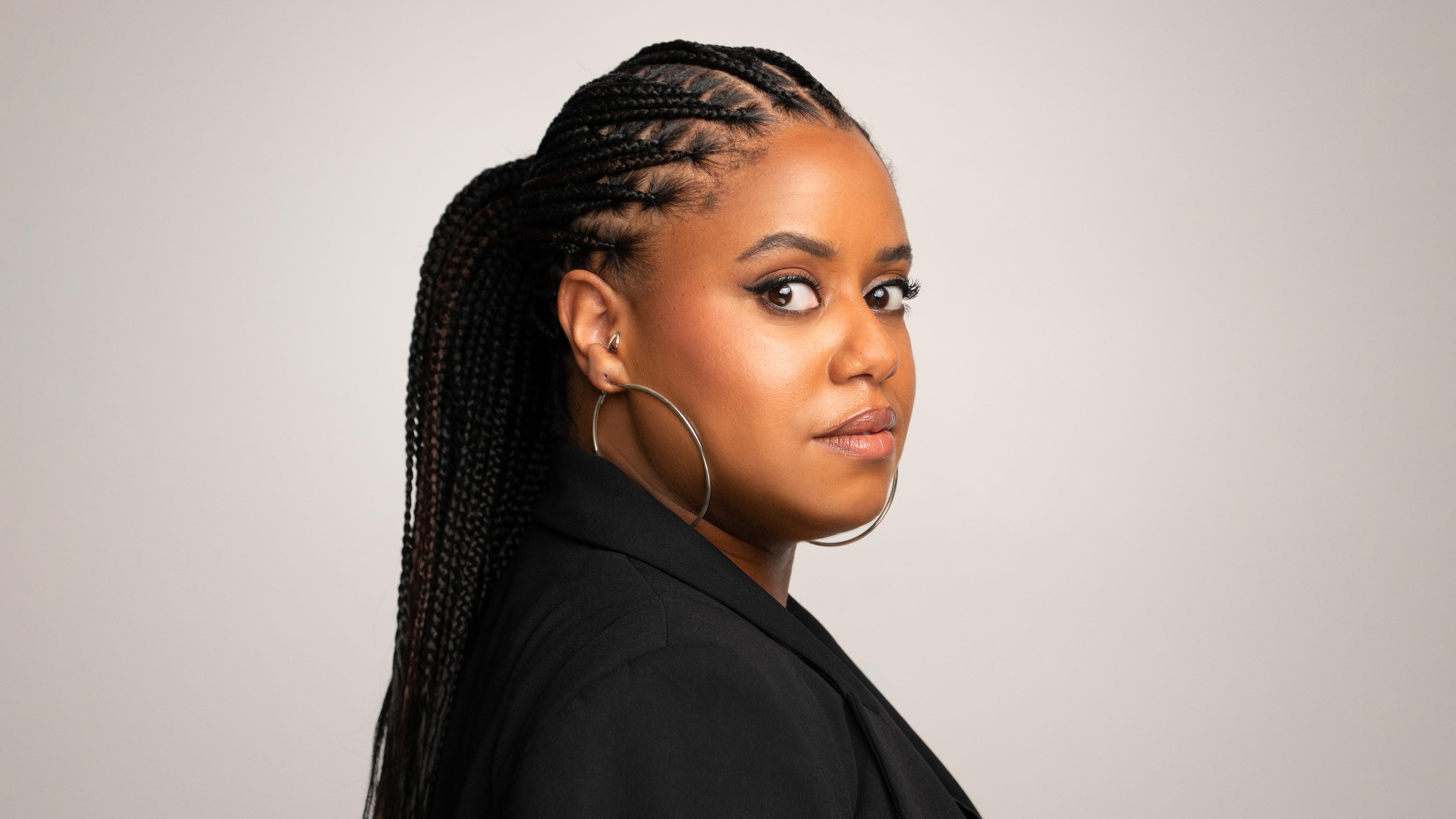 A headshot of Shay Bland