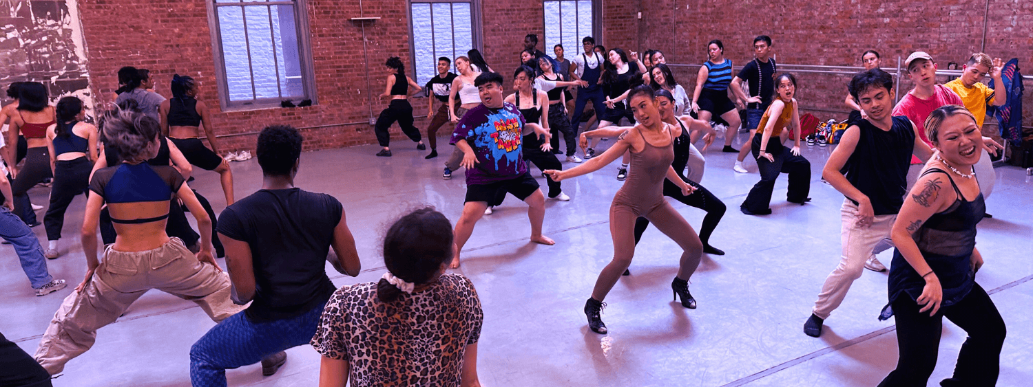 Waacking students in a dance studio performing a combination