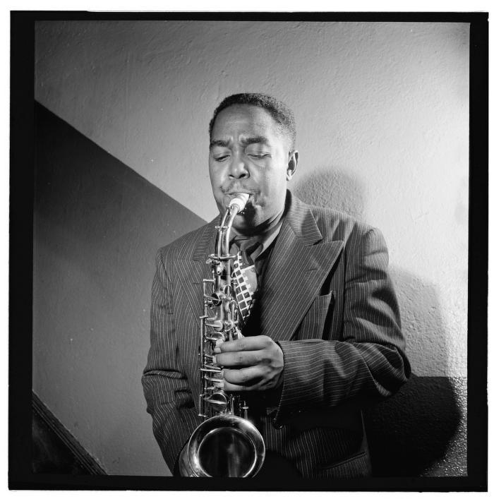 Black and white photo of Charlie Parker playing saxophone at Carnegie Hall