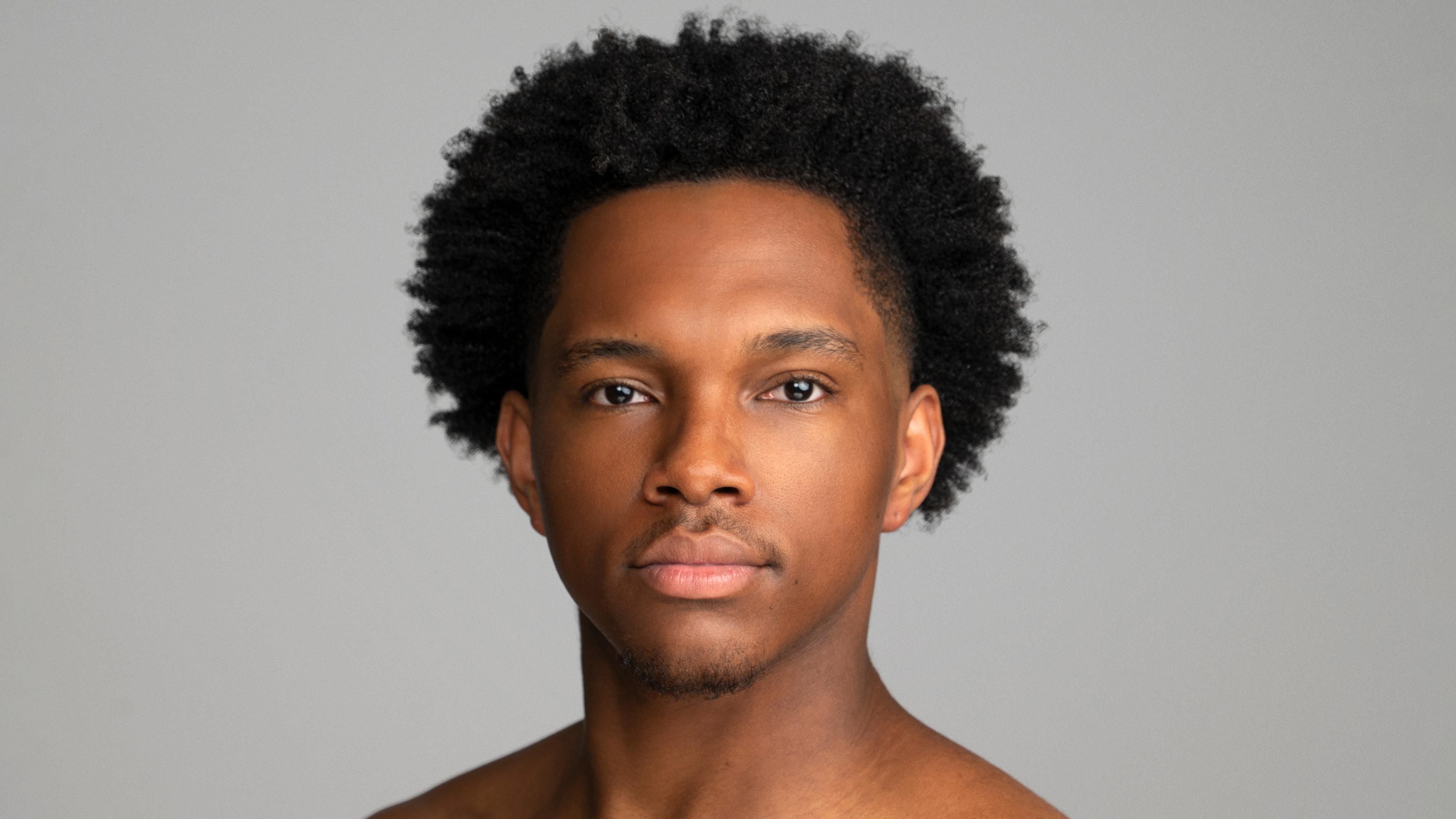 A headshot of Christian Butts