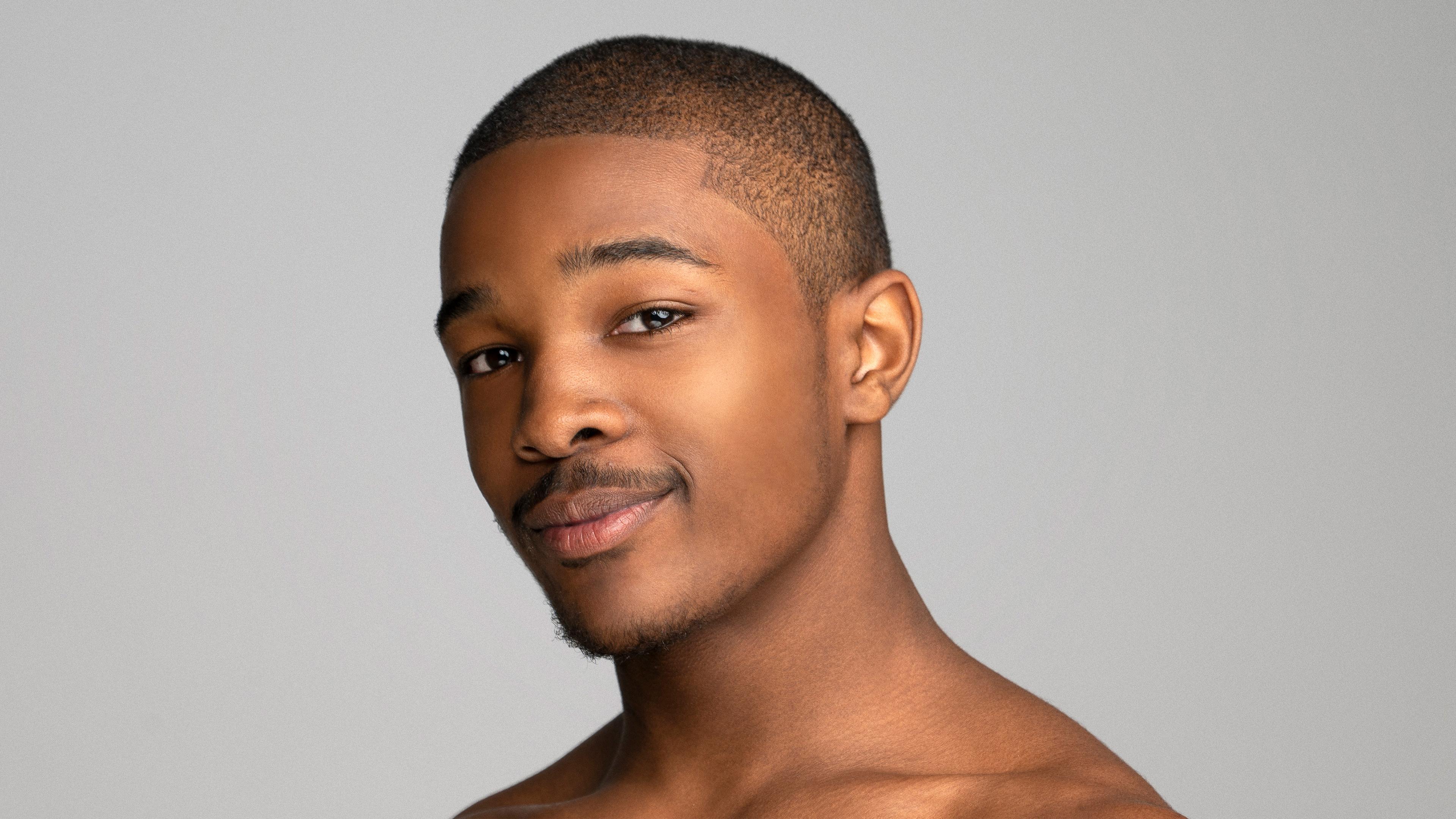 A headshot of Vic E. Davis a man with short hair and facial hair